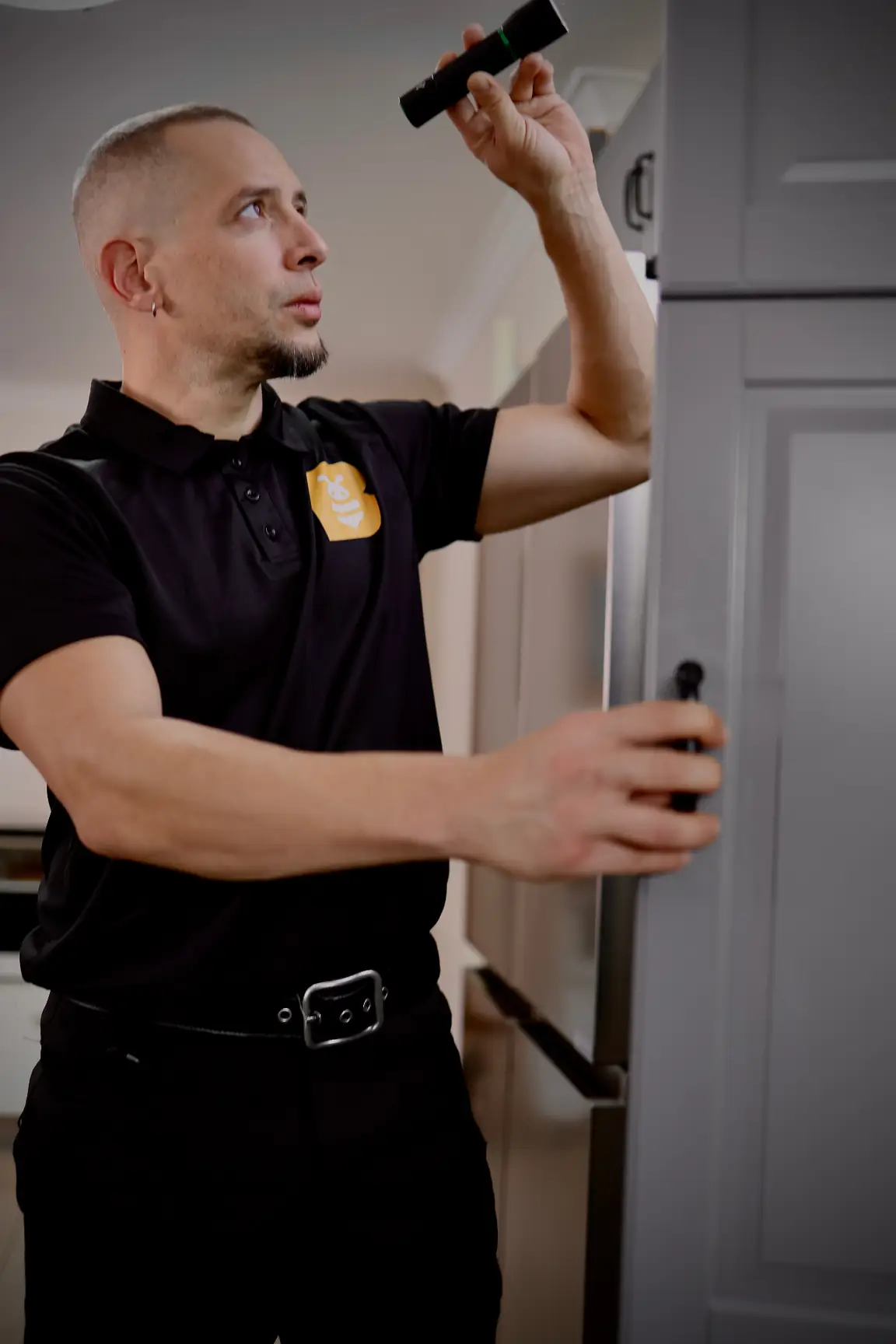 FAB Pest Control technician explaining findings to a homeowner
